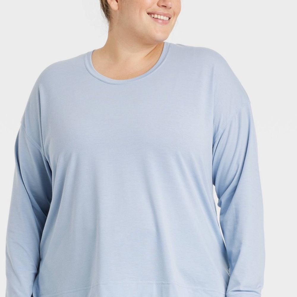 A bundle of 3 tops. Large, 1X, XXL. All shirts new.